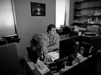 Mike Riley, SSVF Outreach Specialist, works in his office at the Veterans Transition House currently housed at the rectory of the now closed St. John church on County Street in New Bedford, MA. A new building is scheduled tol be constructed in 2019.  PHOTO PETER PEREIRA STANDARD-TIMES ]